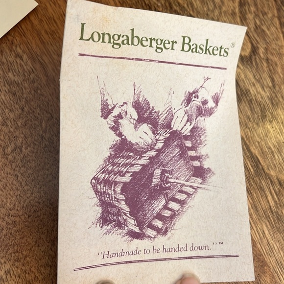 Longaberger Basket. Red & blue trim. 10.5 by 7.5 w/ handle. Paperwork included. - Picture 3 of 6